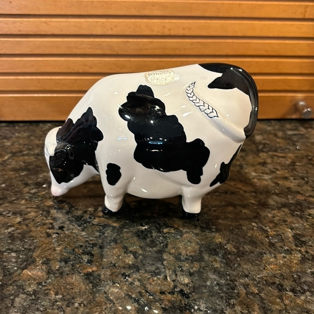 Clay art hand painted cow bank